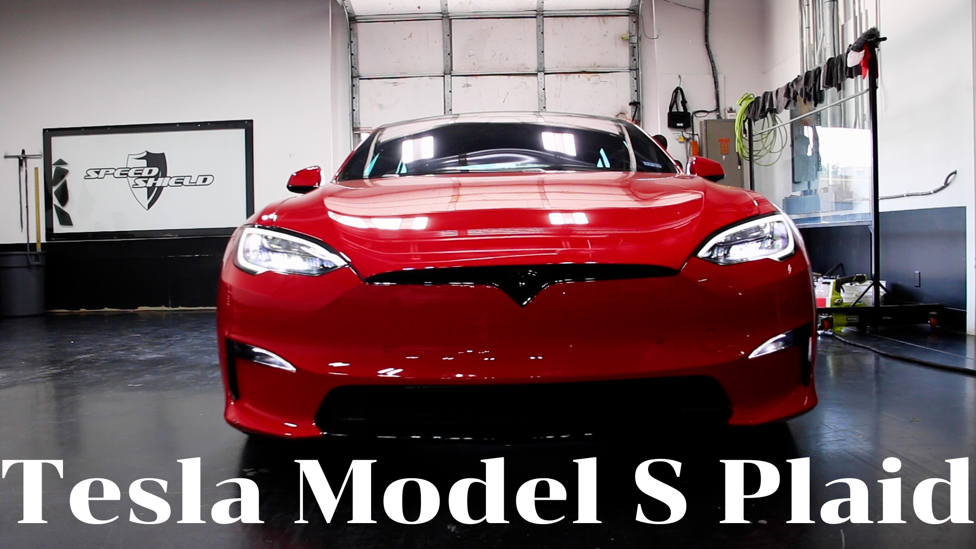 Tesla Model S Plaid with text overlay